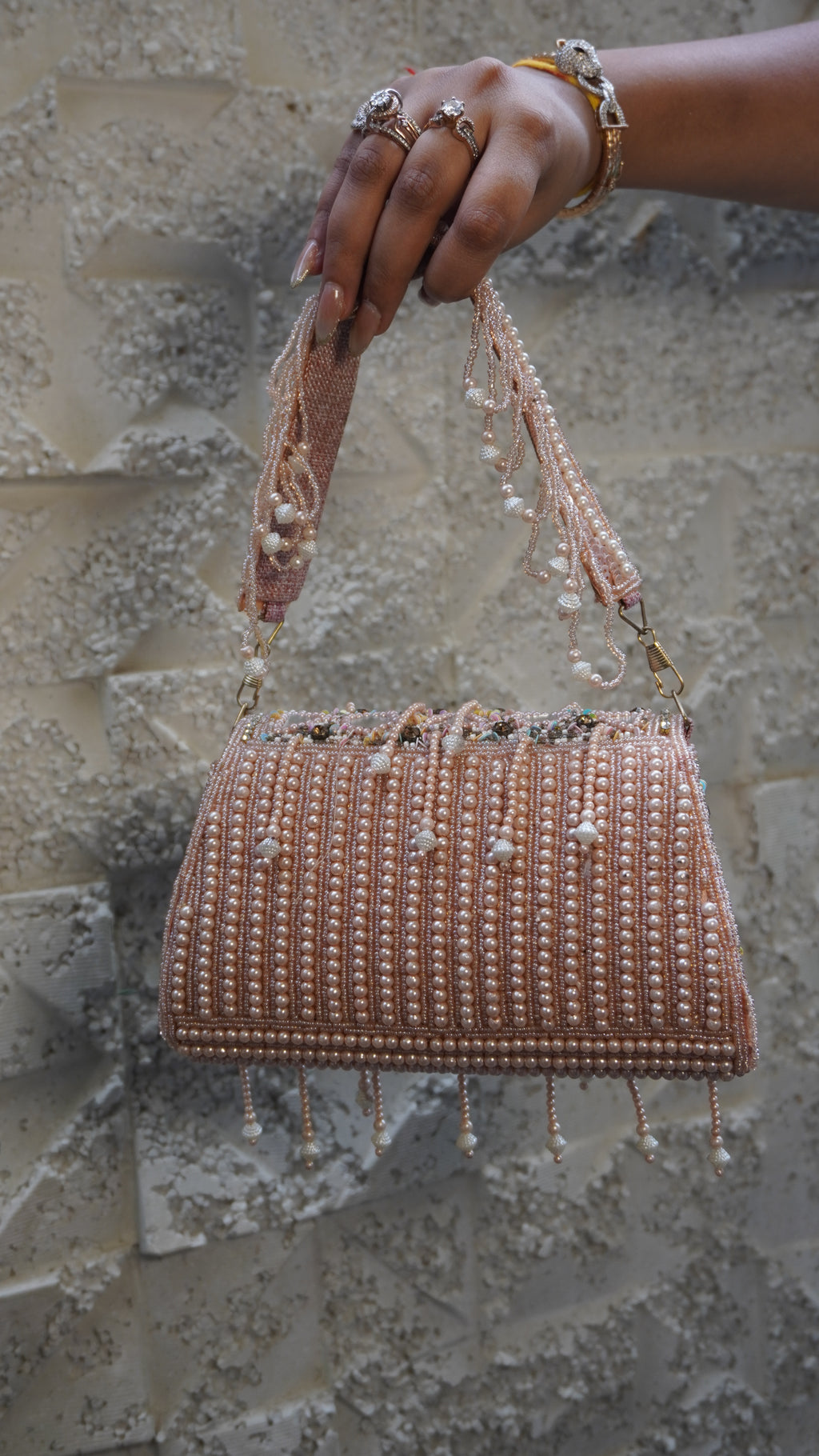 HER LABEL Pink Embroidered Mirror Work Clutch angled view