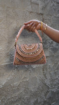 Pink heavy embroidered bridal clutch with U-shaped beadwork and top handle