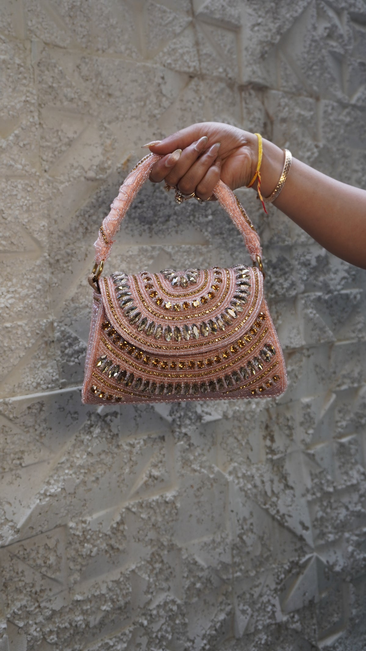 Pink heavy embroidered bridal clutch with U-shaped beadwork and top handle