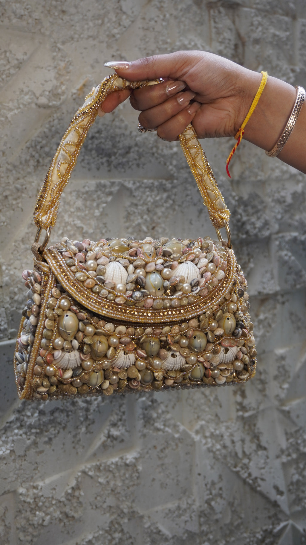 Golden shell work clutch front and curved flap