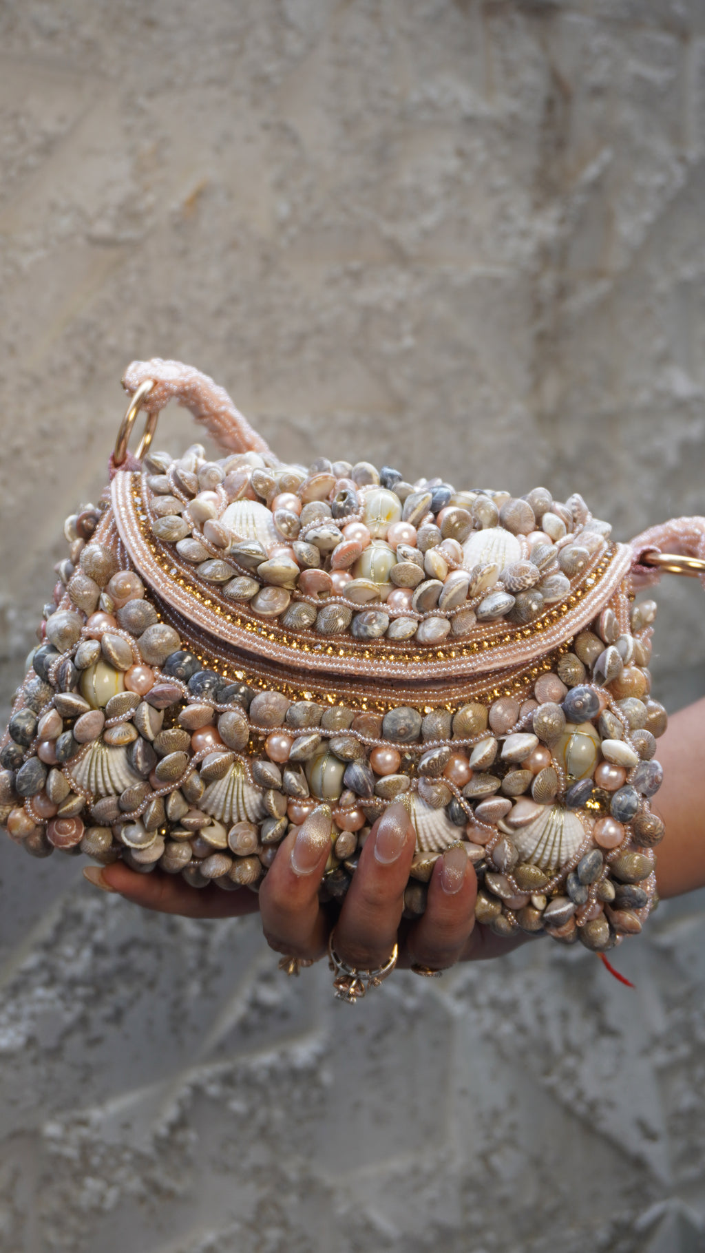 Pink shell work clutch with matching embellished handle
