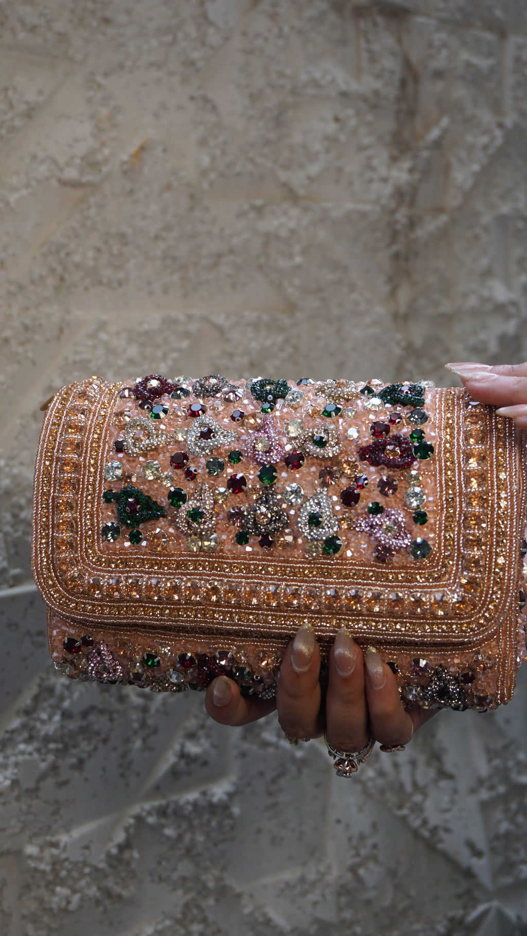 Pink rectangular bridal clutch front with decorative beadwork borders