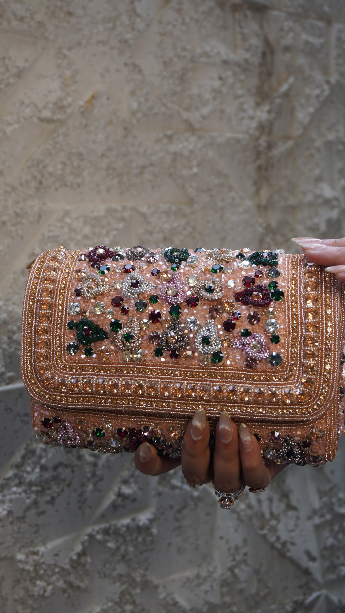 Pink rectangular bridal clutch front with decorative beadwork borders