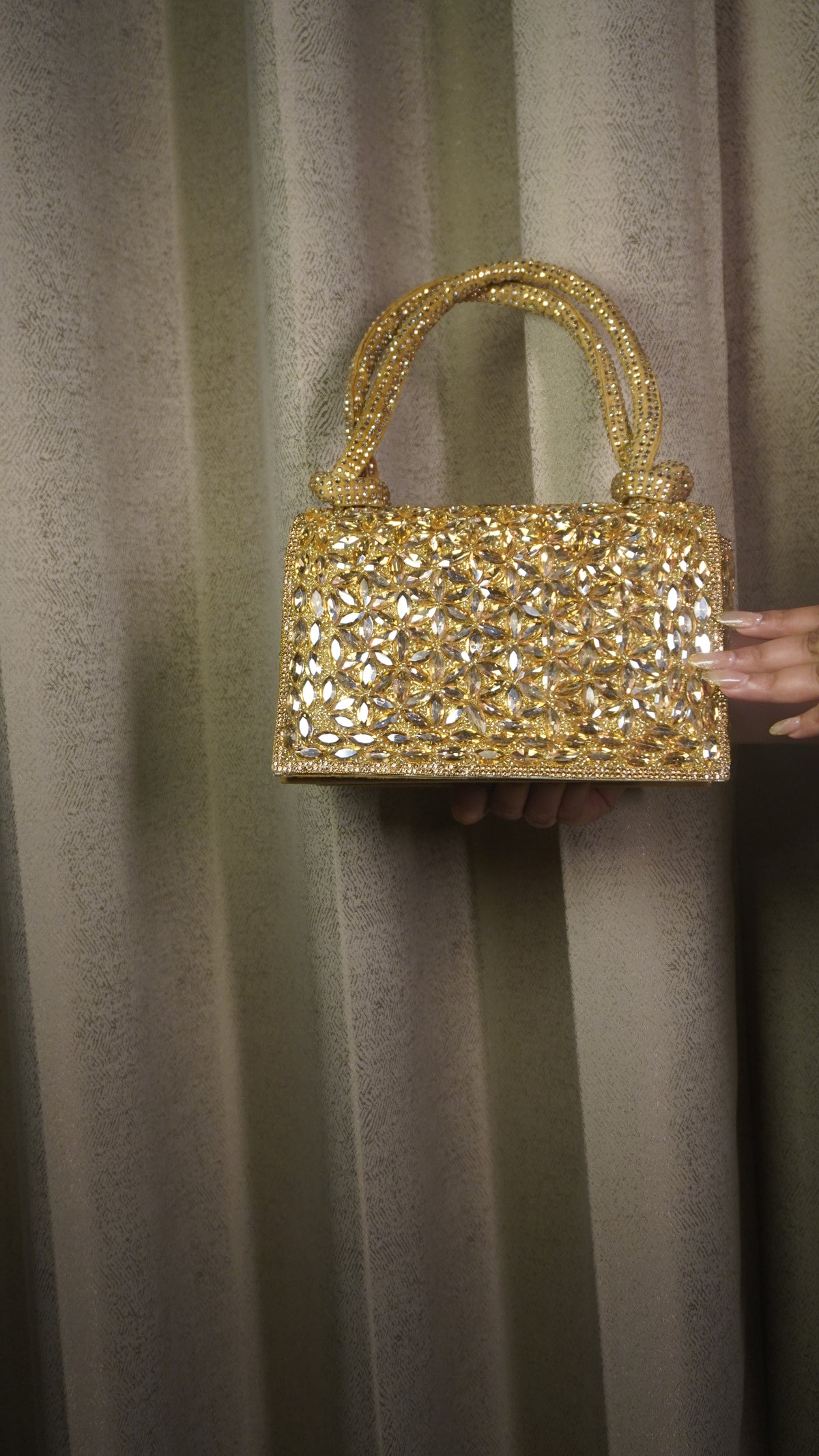 Dark golden Indian crystal clutch with matching embellished handles