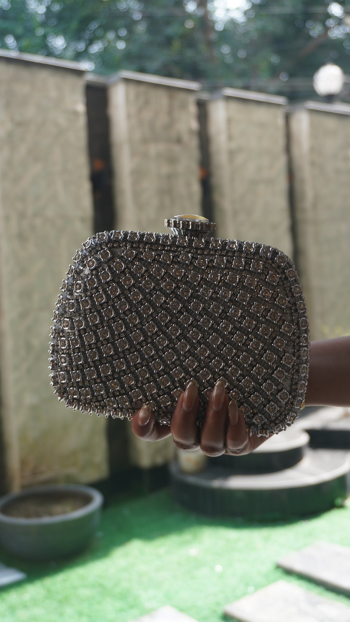 Silver crystal bridal clutch viewed from above showing decorative clasp
