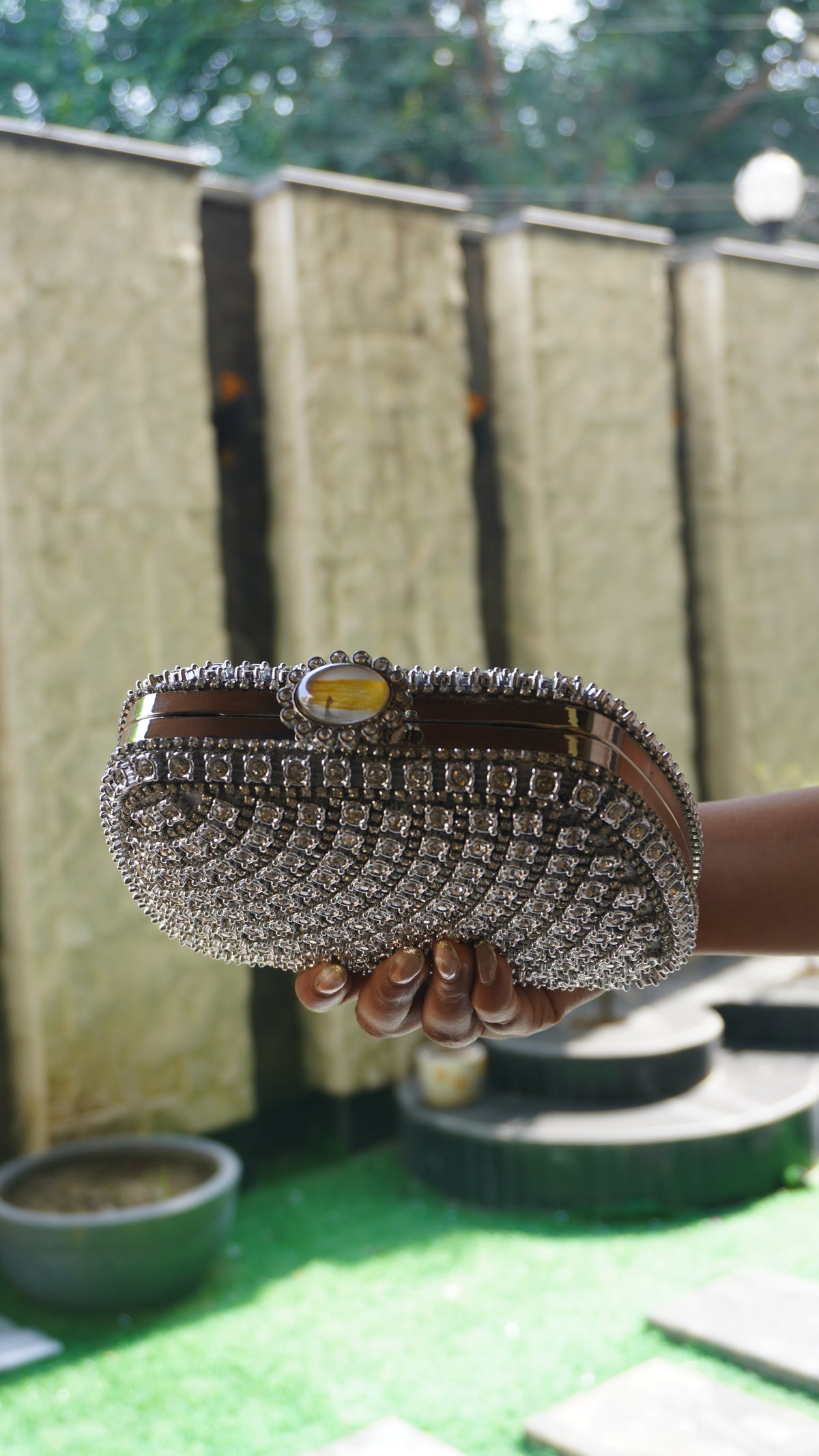 Silver bridal clutch with heavy Indian crystal work and decorative top clasp