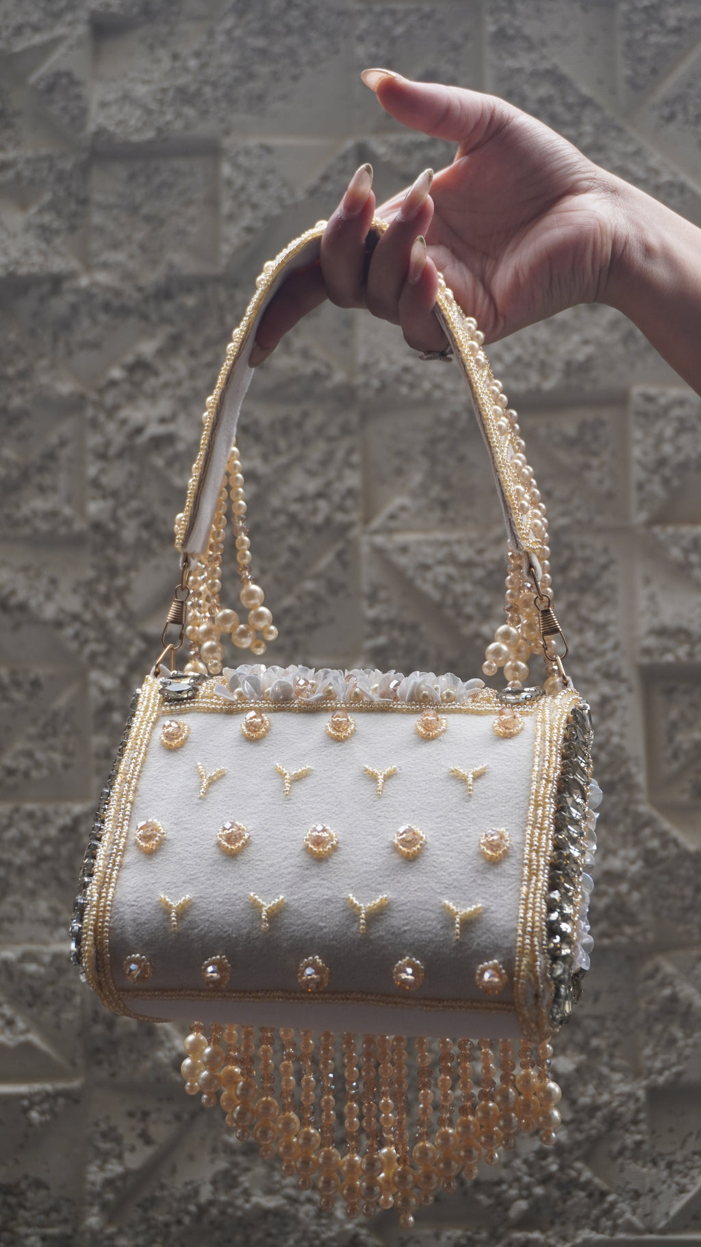 Golden floral beaded handbag with cascading bead fringe, front view