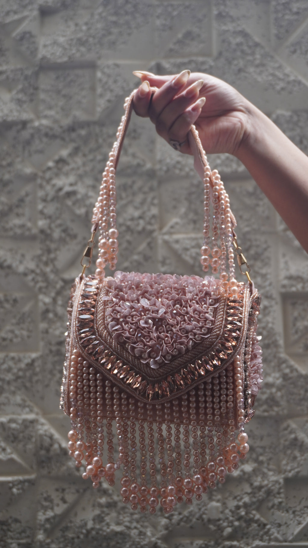 Pink handbag with floral beadwork, sparkling trim and cascading bead fringe